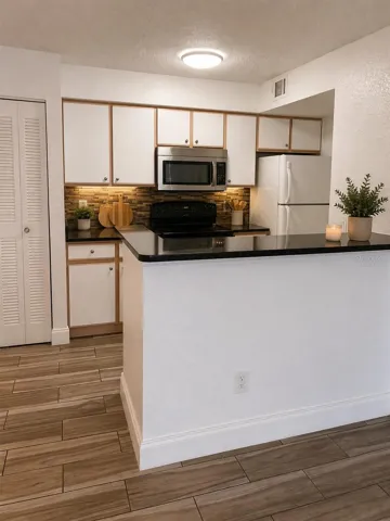 The  photos have been virtually staged and/or digitally enhanced using AI for marketing purposes only. Furniture, décor, and other staged items shown in the images are not included with the sale or lease of the property.