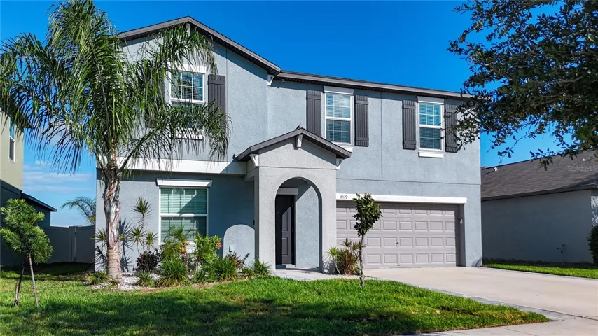Welcome to 5519 Blue Azure Drive, a beautifully upgraded 4-bedroom, 2.5-bath home featuring a versatile flex room, spacious bonus loft, and a stunning heated saltwater pool and spa overlooking peaceful pond views—offering the perfect blend of comfort, style, and Florida living!