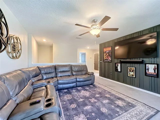 Second-level loft with custom accent wall
