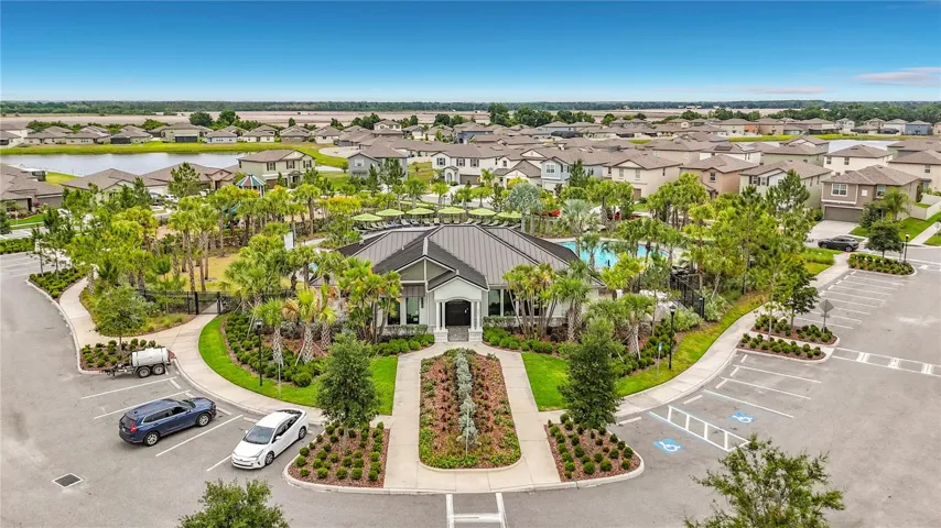 Berry Bay's resort-style amenities include a zero-entry pool, clubhouse, picnic areas, dog park, playground, basketball courts, and pickleball courts.