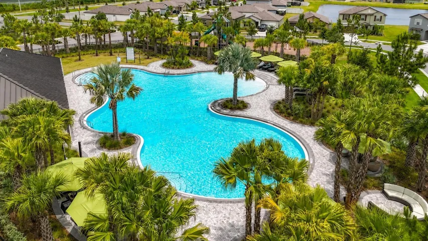 Berry Bay's resort-style amenities include a zero-entry pool, clubhouse, picnic areas, dog park, playground, basketball courts, and pickleball courts.