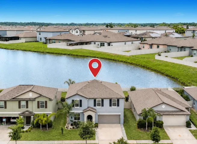 Beautiful 2023-built 4-bedroom, 2.5-bath home with a flex room, bonus loft, heated saltwater pool and spa, and serene pond views