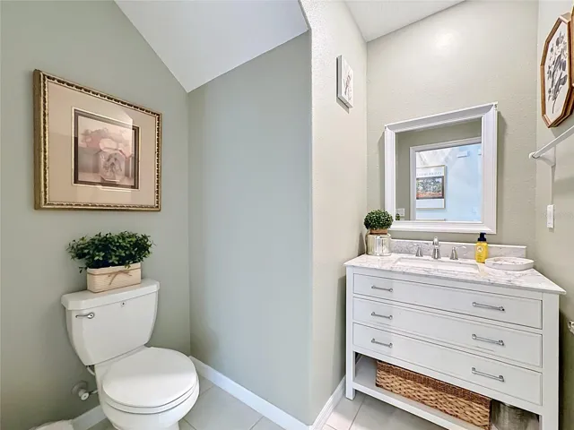 Convenient first-floor half bath off the foyer