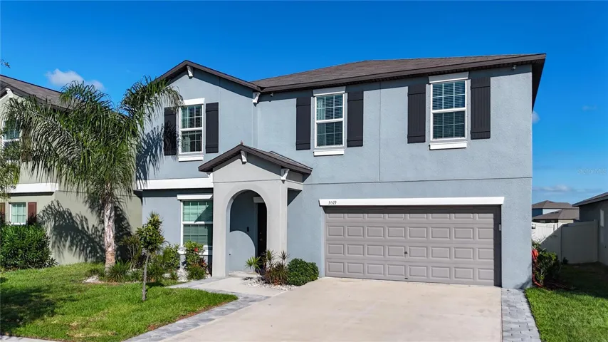 Welcome to 5519 Blue Azure Drive, a beautifully upgraded 4-bedroom, 2.5-bath home featuring a versatile flex room, spacious bonus loft, and a stunning heated saltwater pool and spa overlooking peaceful pond views—offering the perfect blend of comfort, style, and Florida living!