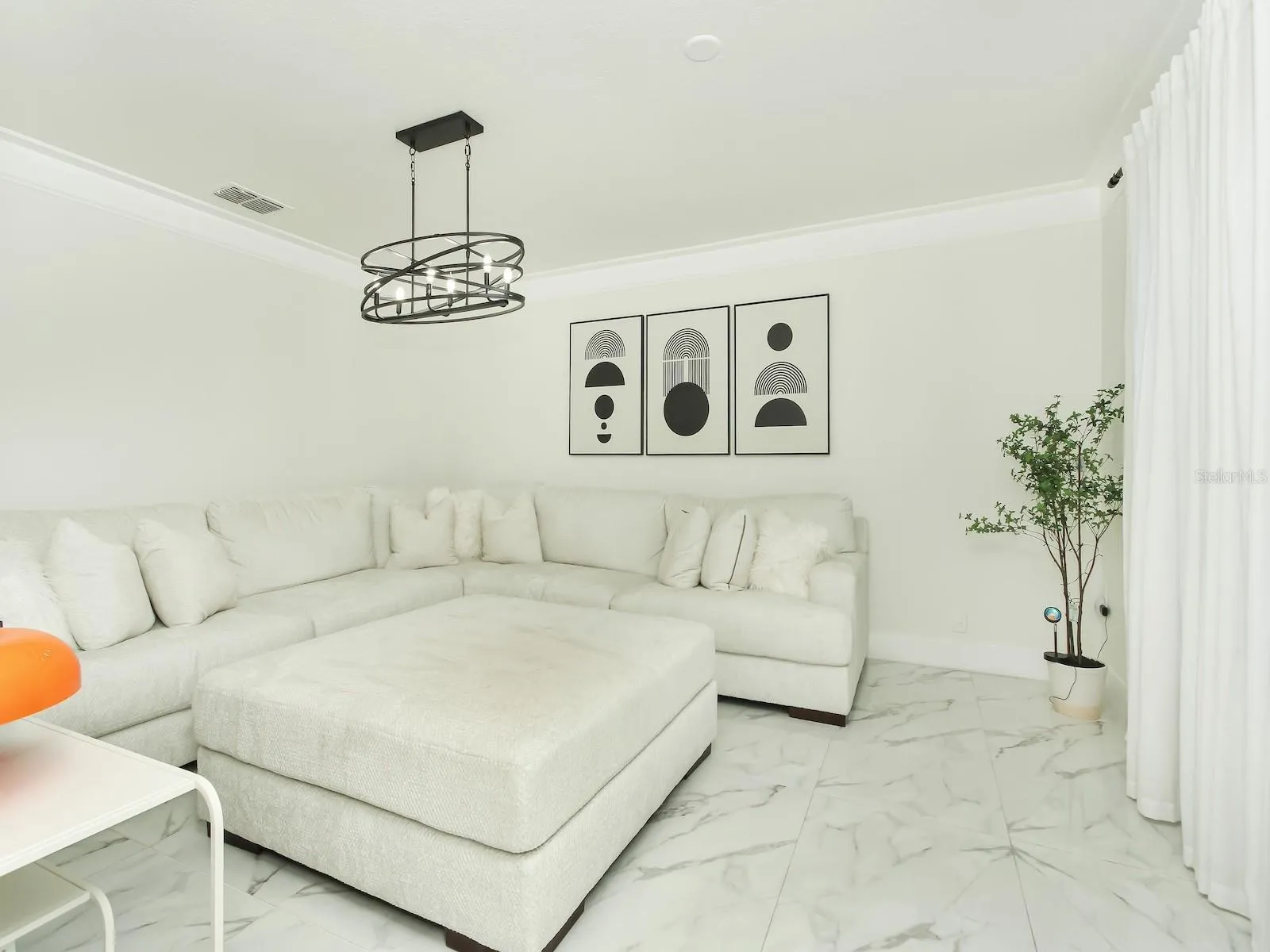 Formal Living room is tuck away for a private setting for late night cap and great conversation