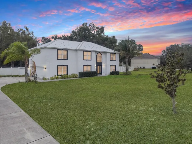 see the homes presence as you pull up in your long driveway and pull up to your 3 car garage