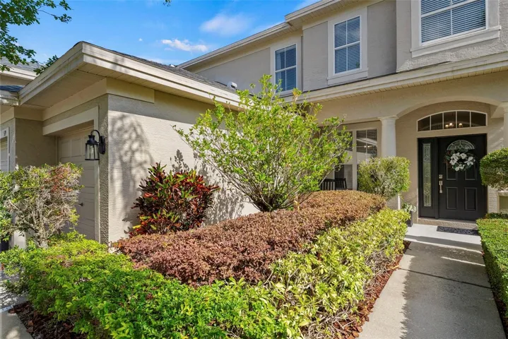 Beautifully landscaped approach to the front door.