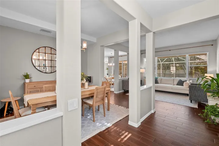 Formal dining and sitting room upon the front entry.