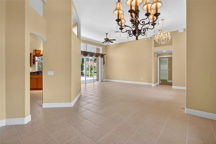 ACROSS FROM THE DINING ROOM IS THE KITCHEN ON THE LEFT.