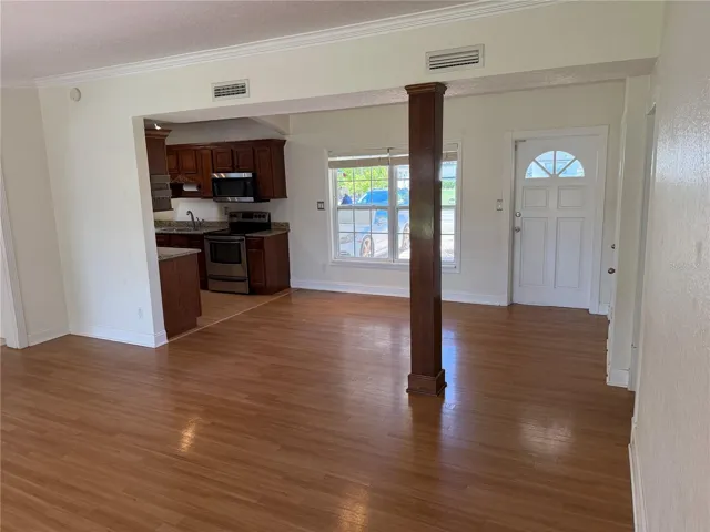 Living room looking towards dining area and kitchen