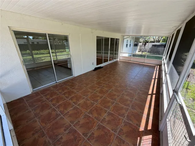 Lanai looking back toward den and living room sliding doors