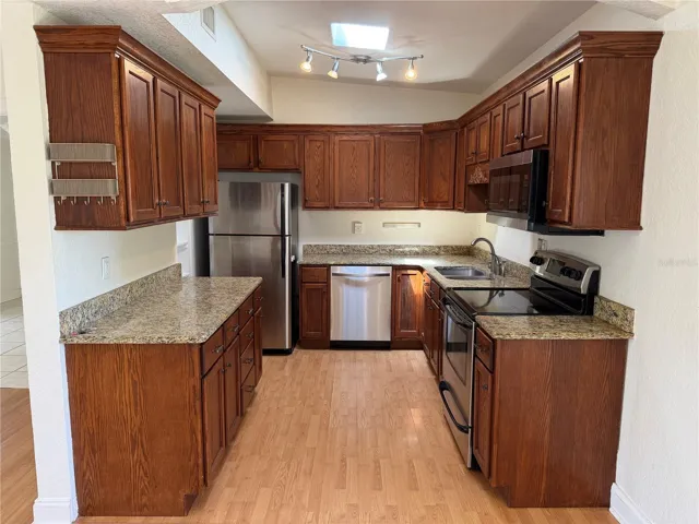 Kitchen with natural light from skylight above