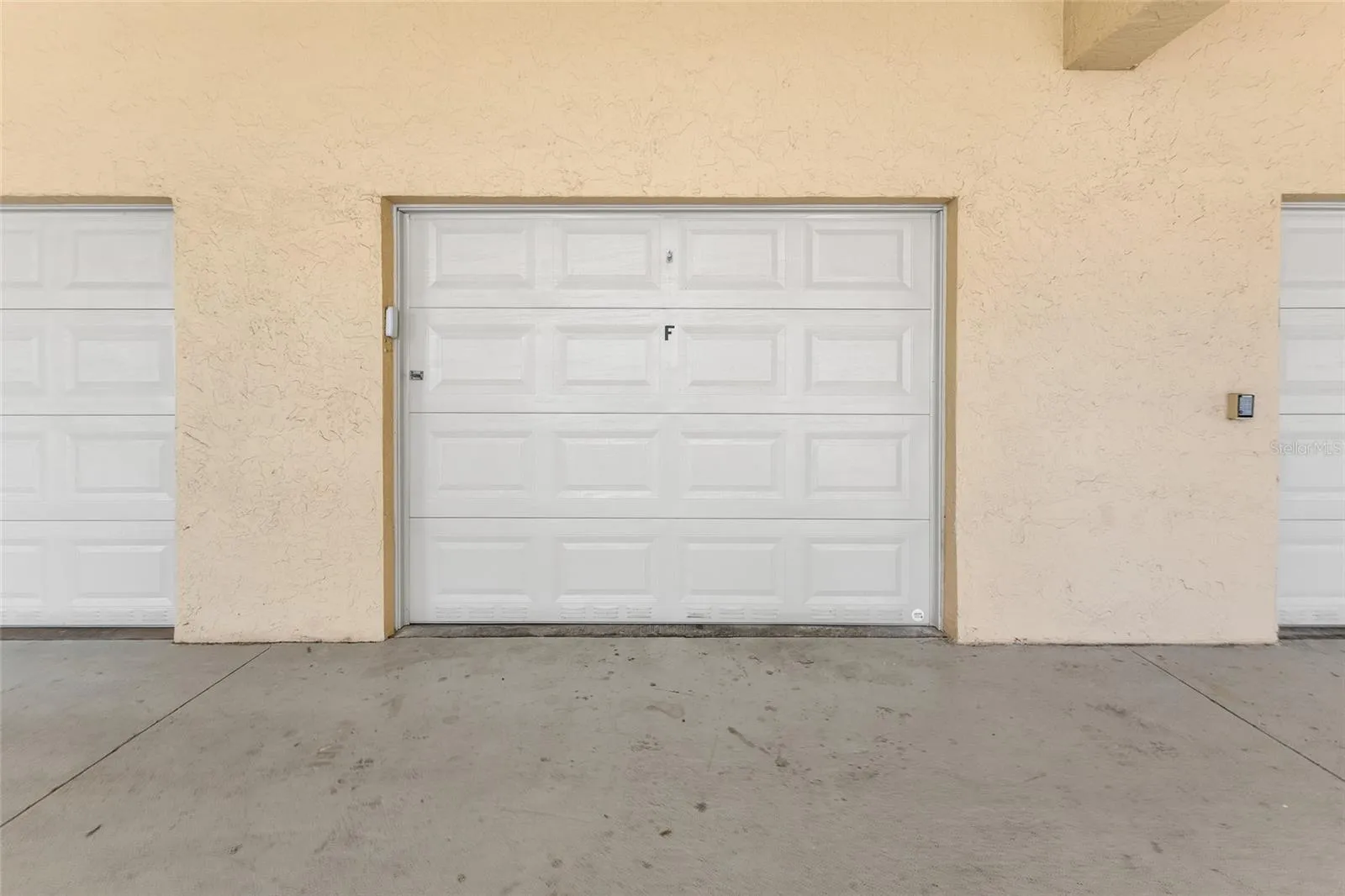 Garage F. 12' 3" wide and 20' 0" deep with storage platform