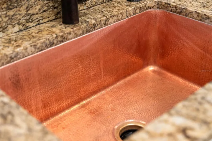 Kitchen with copper sink