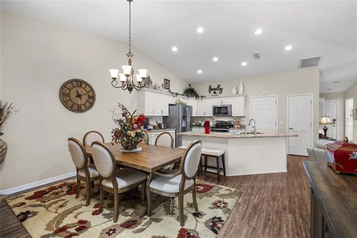 Light, Bright and OPEN Kitchen and dining area with cathedral ceilings