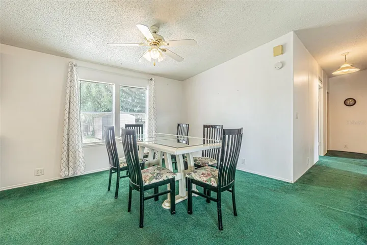 Dining room with a view of the large backyard
