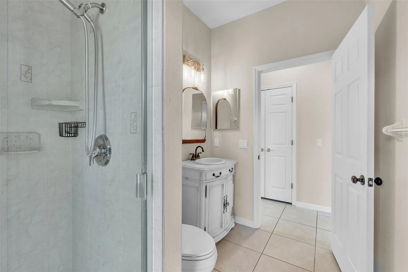 full bathroom - with access to the back patio