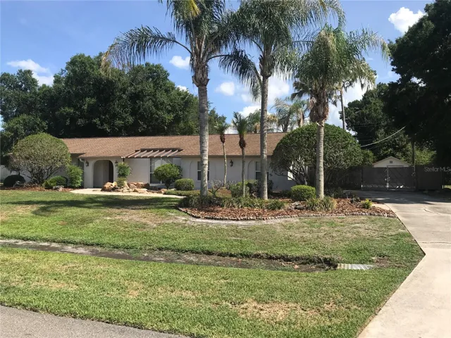 FRONT ELEVATION with LONG DRIVEWAY