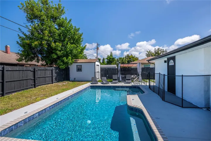 The pool was recently refinished with a stonescape finish and new tile
