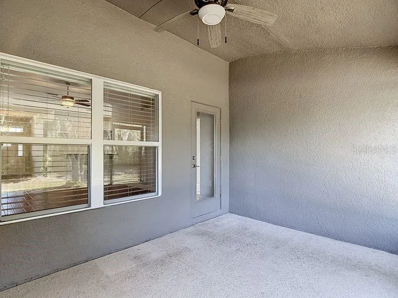 Enjoy tranquil views from the screened in back porch which opens to the spacious backyard. Perfect for relaxing outdoors!!!