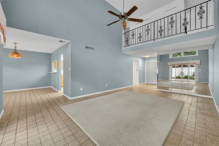 View of dining and upstairs balcony