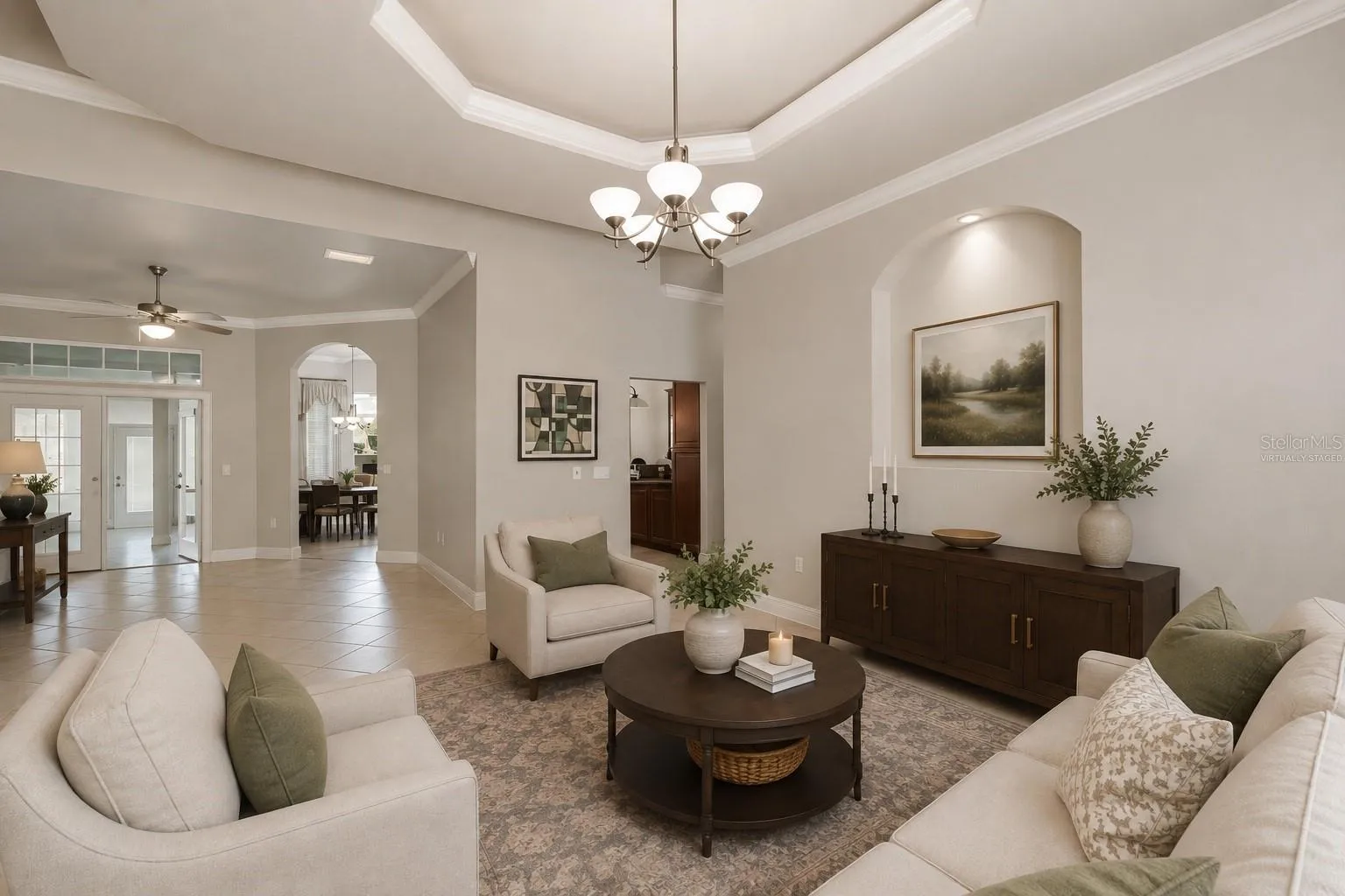 Large living room off foyer, virtually staged