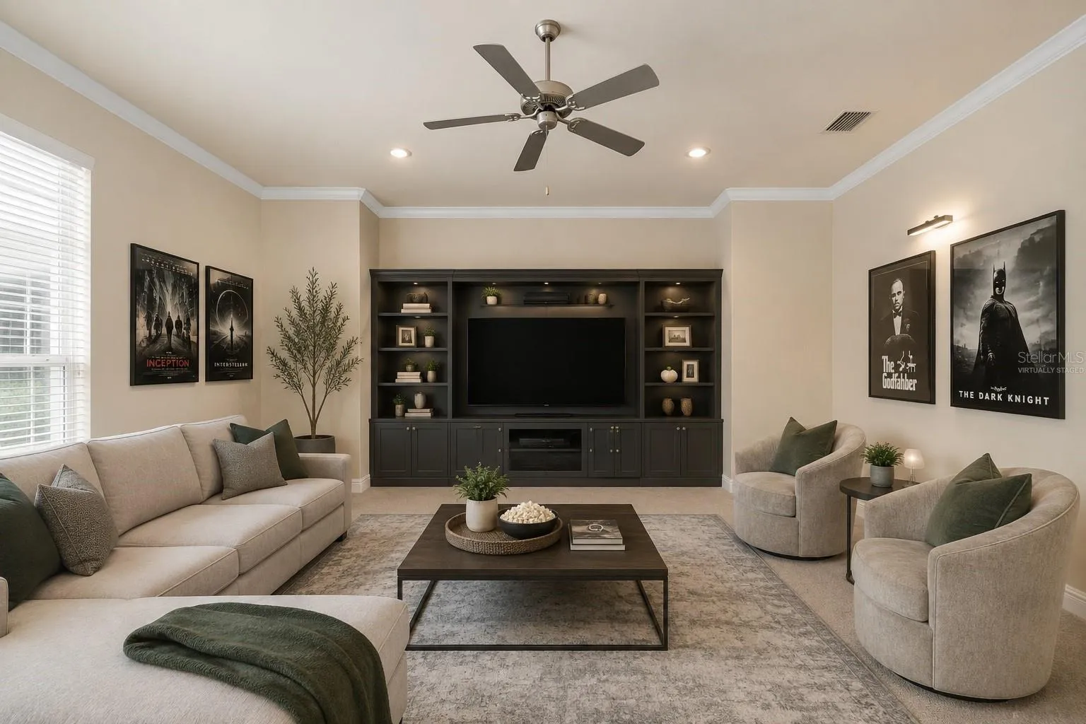 Large media room off family room, virtually staged