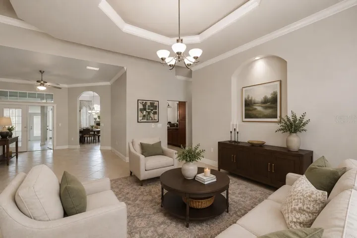 Large living room off foyer, virtually staged