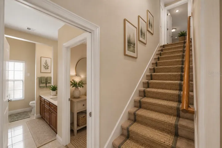 Staircase leads to bonus room, virtually staged