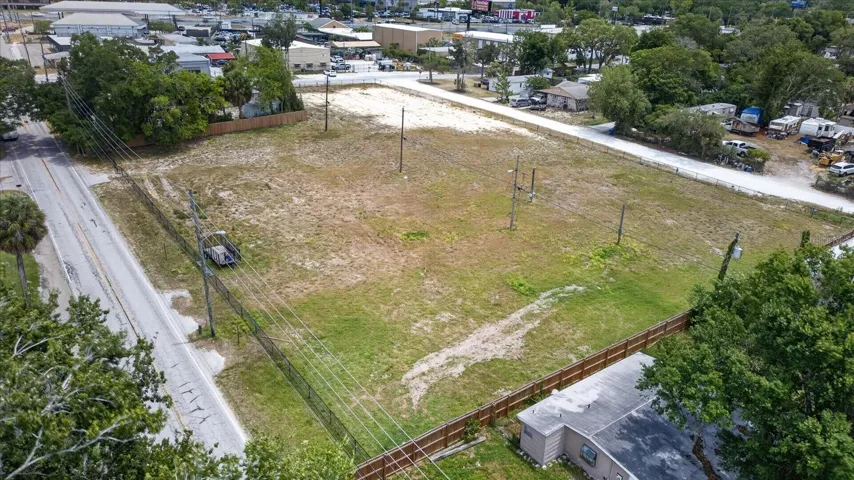 Sold together-9 parcels inside black chain link fence