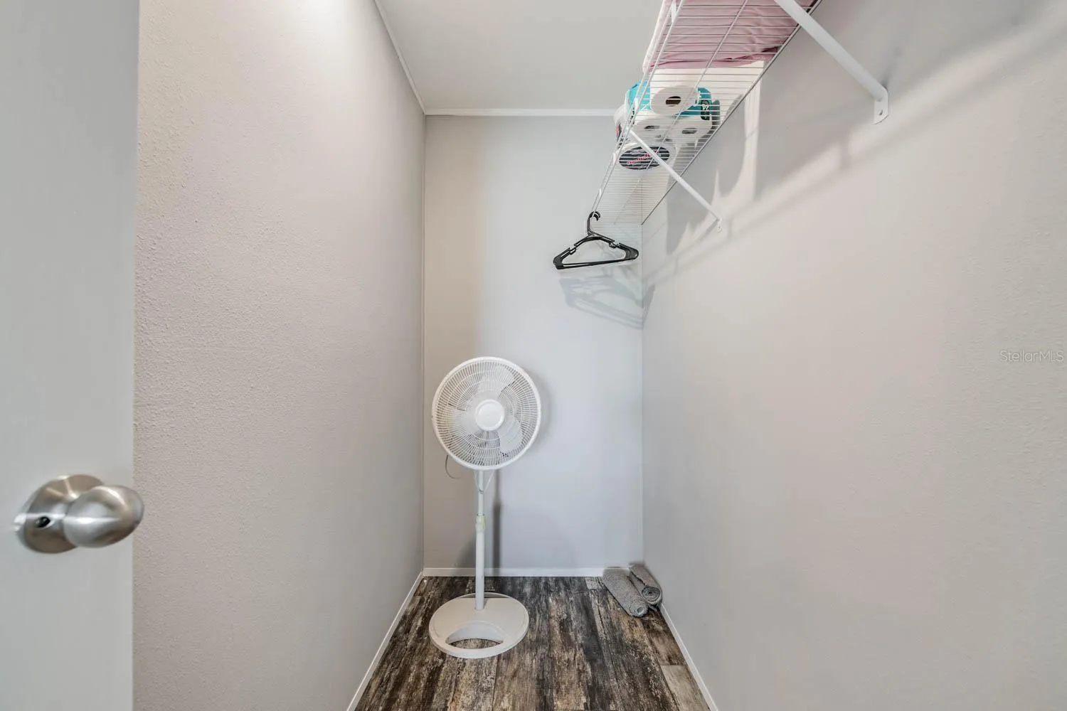 Primary walk-in closet.