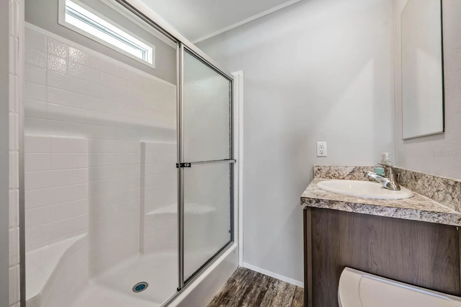 Step-in shower in primary ensuite.