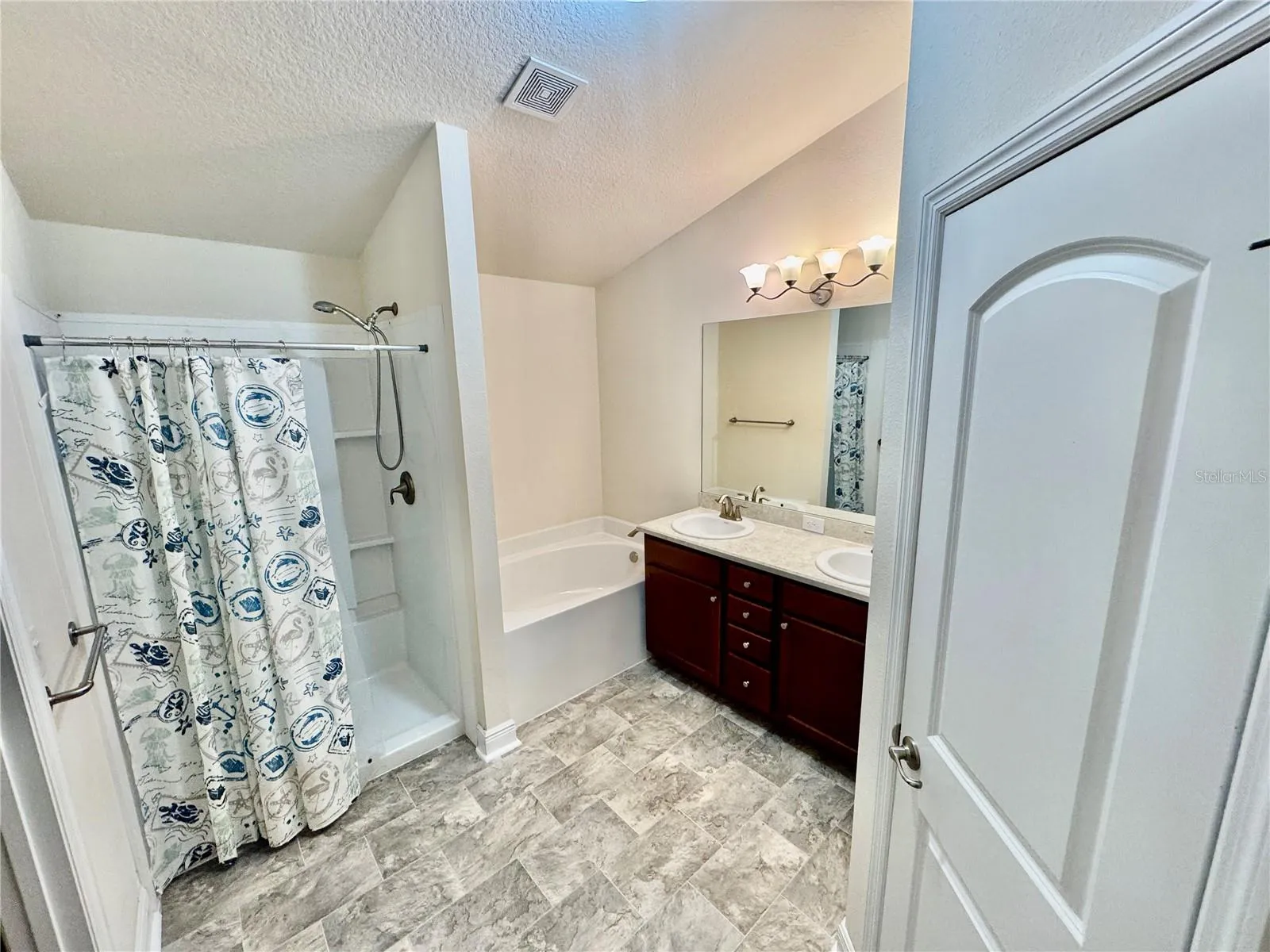 PRIMARY BATH WITH SHOWER AND BATHTUB