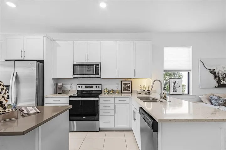 Beautiful kitchen with plenty of cabinet space and a well-sized pantry