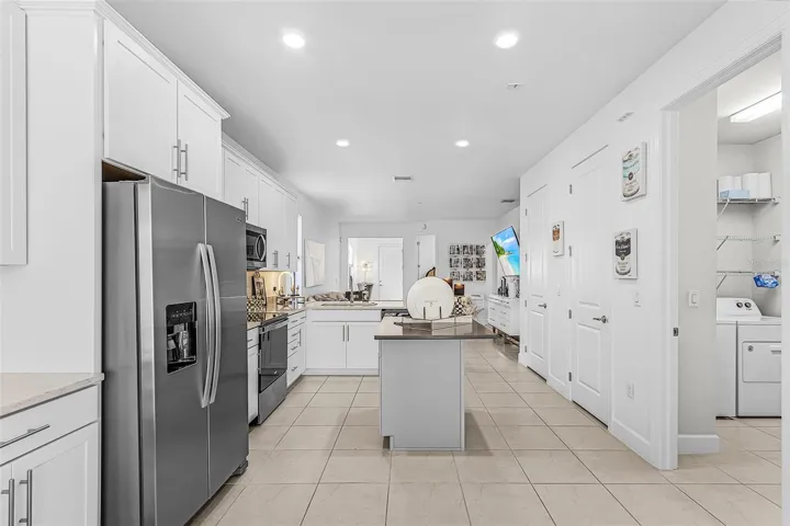 Kitchen opens to the living room