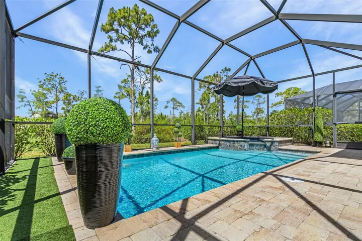 Beautiful pool and spa create the perfect setting for relaxation and outdoor enjoyment
