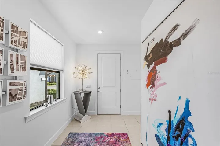 Welcoming entryway with natural light, clean lines, and a modern touch that sets the tone for your home.