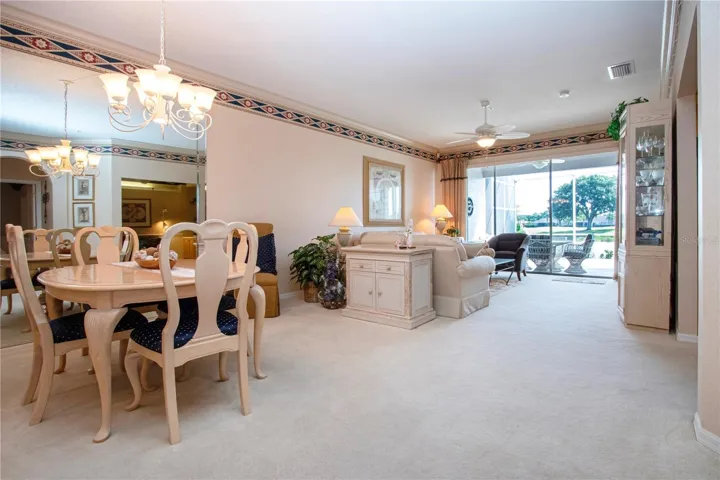 Living space: dining room and living room towards the lanai
