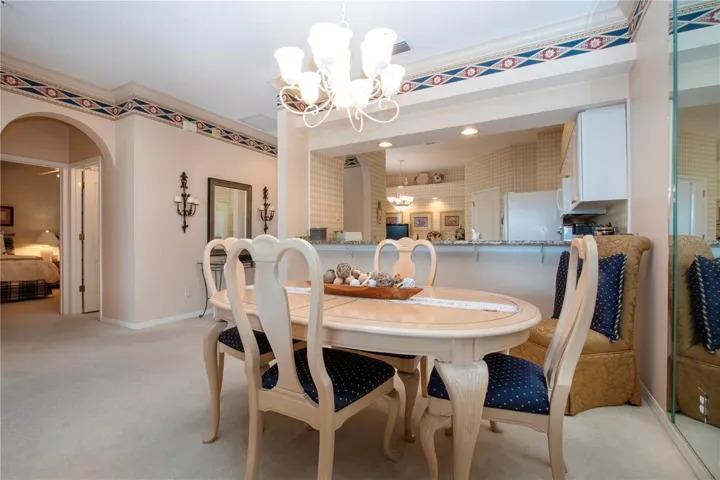 Dining area, kitchen and access to the second bedroom and bath.