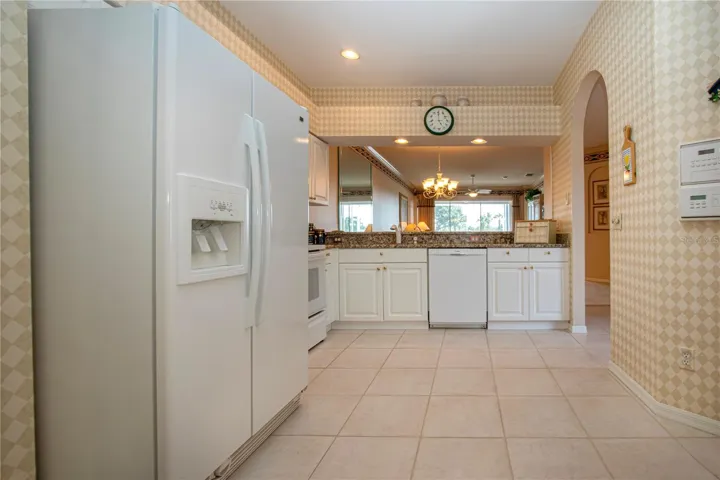 Entry from the attached, two car garage