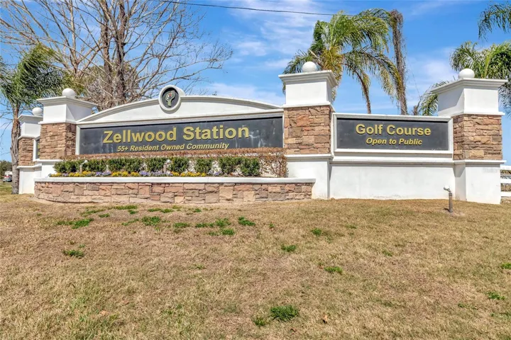 Zellwood Station MAIN ENTRANCE SIGNAGE. Also has a red-light intersection when entering / exiting with their own turning lane