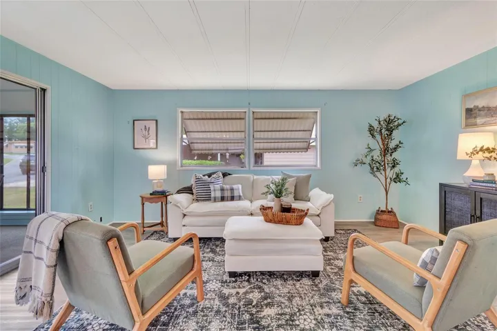 Living Room view as you enter from Florida Sunroom inside