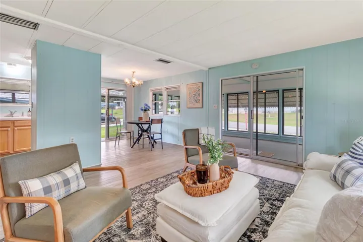 From Living Room looking toward Florida Sunroom on right and Breakfast Area straight ahead