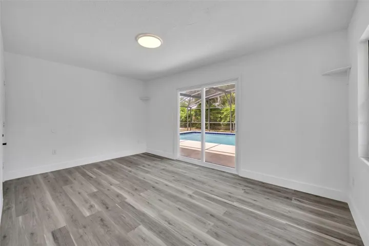 Bonus room with sliding doors to the pool