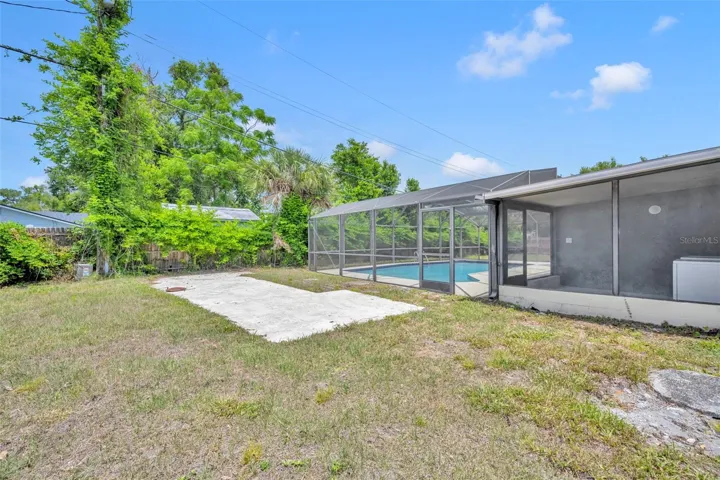 Private side yard with concrete pad