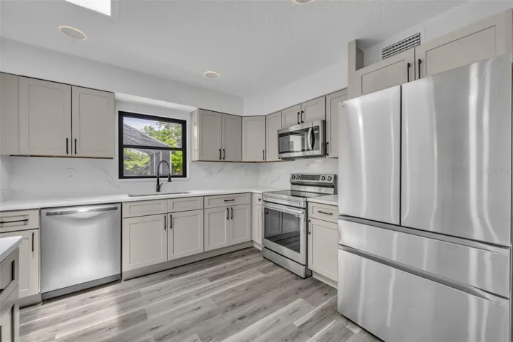 Kitchen with stainless-steel appliances