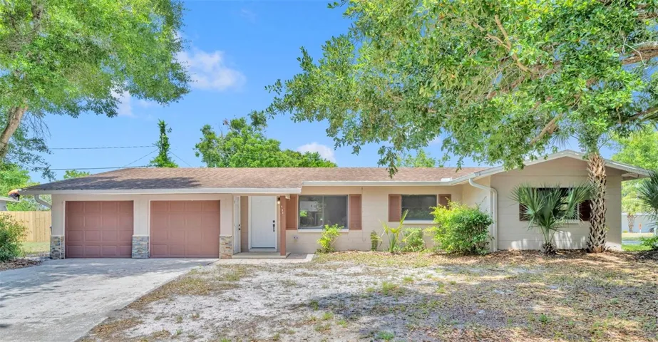 Solid block pool home on a corner lot!