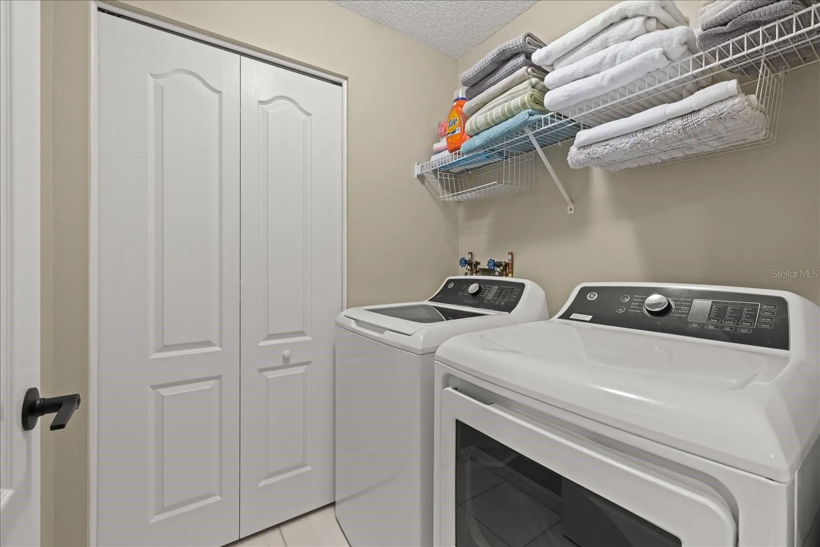 LAUNDRY ROOM WITH STORAGE CLOSET