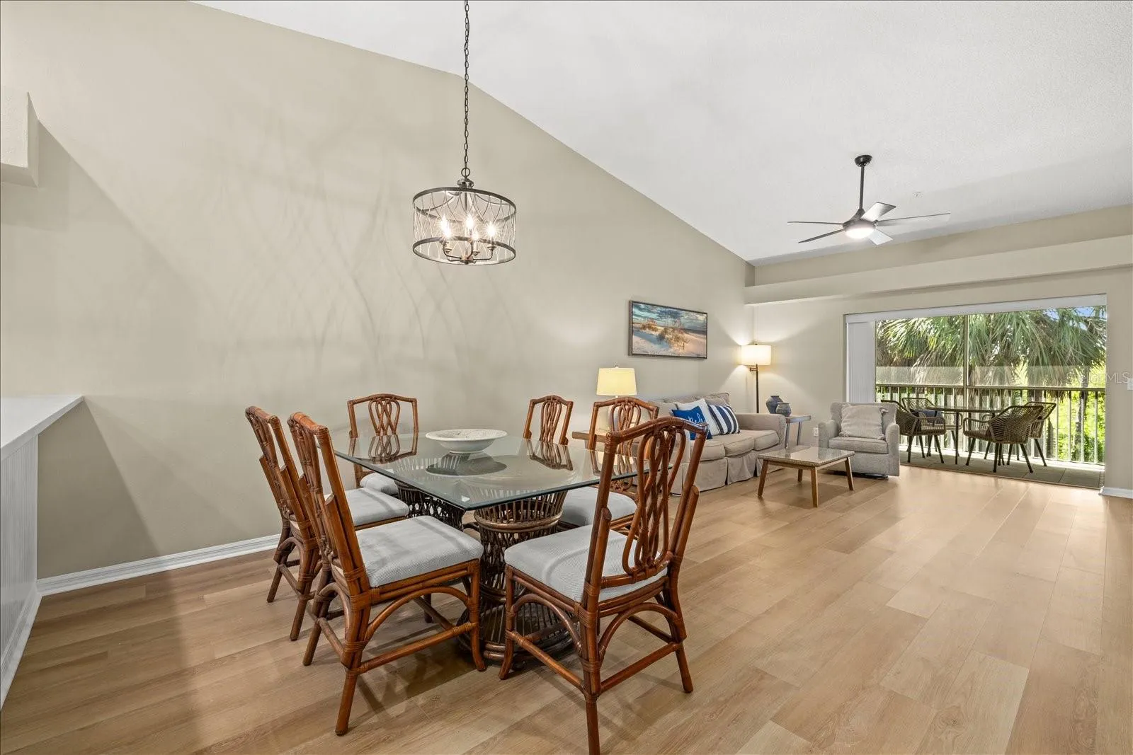 GREAT ROOM OPENING TO THE BACK TROPICAL PARADISE.