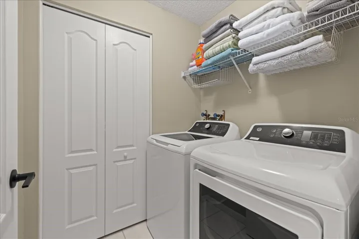 LAUNDRY ROOM WITH STORAGE CLOSET